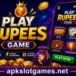 Play Rupees Game promotional banner with a smartphone gaming interface, gold rupee coins, rewards, and apkslotgames.net displayed at the bottom.